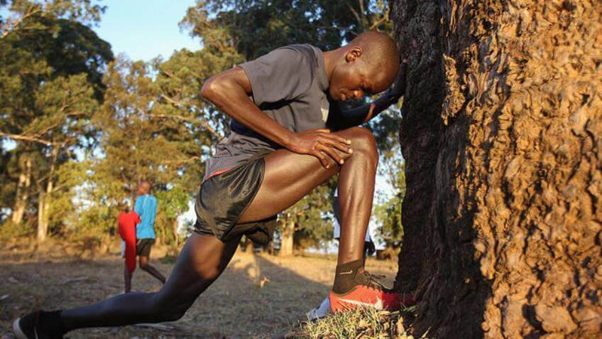 Stretching out leg cramps during a marathon